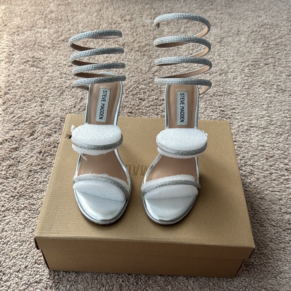 STEVE MADDEN EXOTICA SILVER HEELS